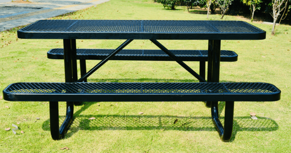 A Black Picnic Table in a Grassy Area